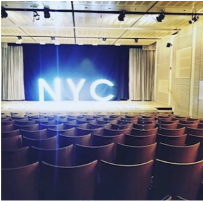 ConnectNYC agent showcase venue with the NYC stage and audience seating
